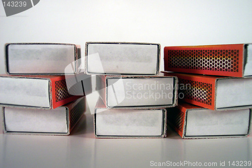 Image of nine match boxes