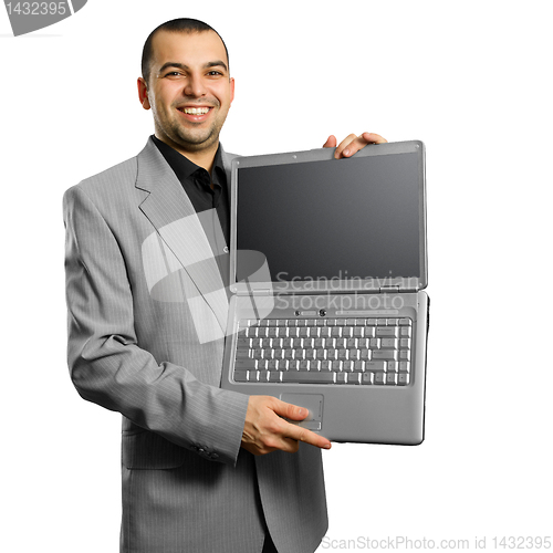 Image of businessman with open laptop in his hands