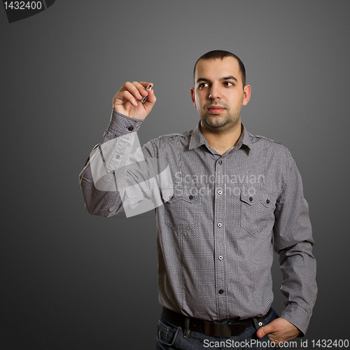 Image of businessman writing something