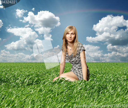 Image of Blond in green grass