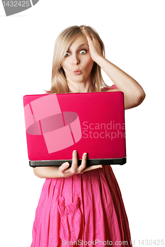 Image of blonde in pink dress with laptop