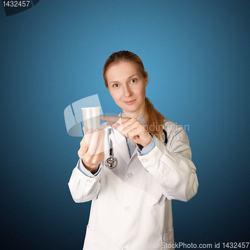 Image of doctor woman with cup for analysis