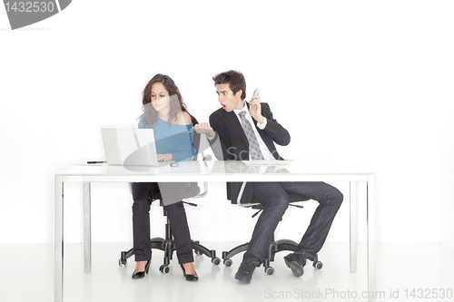 Image of girl and boy working busy and surprized in office