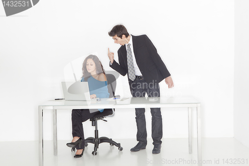 Image of boy shouting to girl at the office