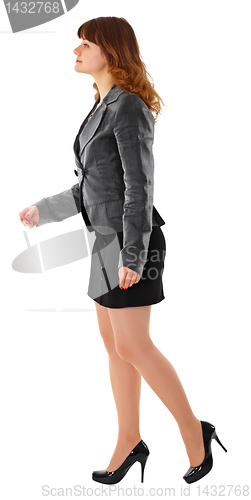 Image of Girl in business suit comes on a white