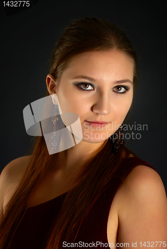 Image of Portrait of young woman with red hair