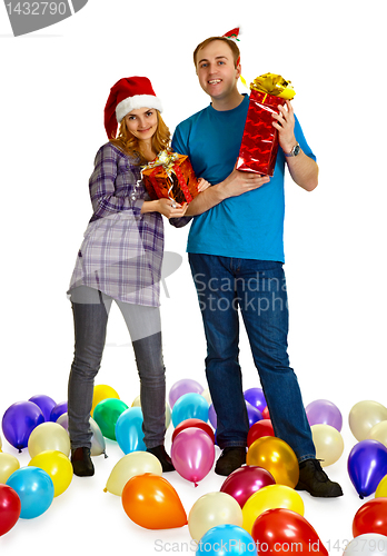 Image of Family couple with Christmas gifts