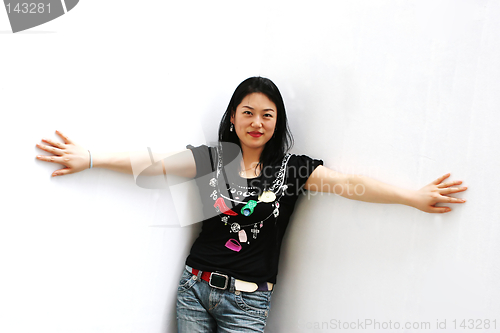 Image of Portrait of a Korean woman in jeans and a t-shirt