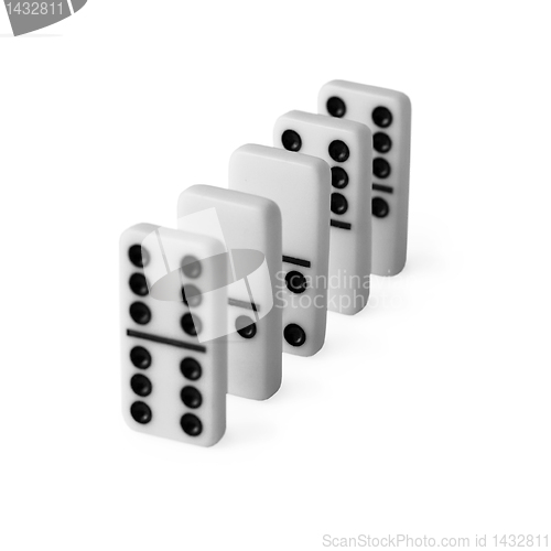 Image of Dominoes set in row on white background