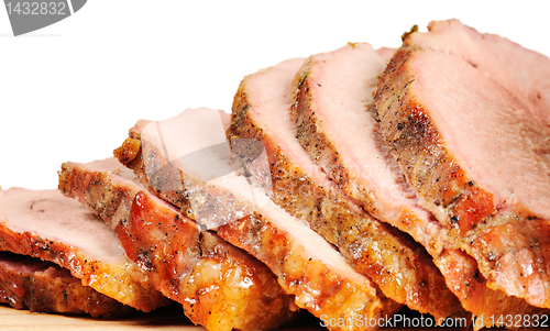 Image of Roast pork on a wooden board