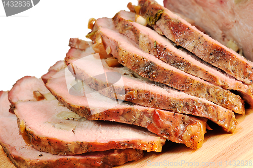 Image of Roast pork on a wooden board