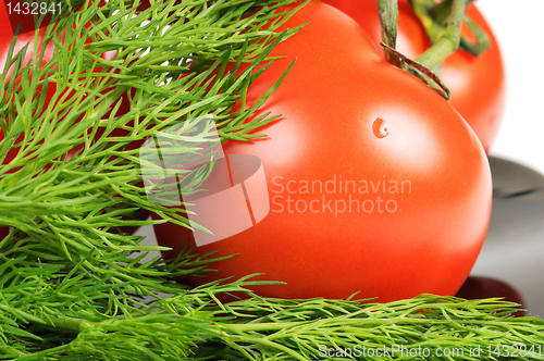 Image of Tomatoes on a black plate