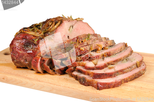 Image of Roast pork on a wooden board