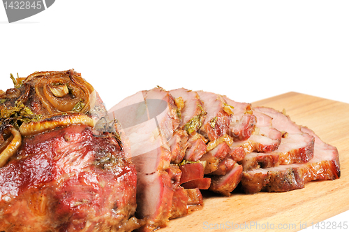 Image of Roast pork on a wooden board