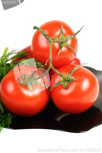 Image of Tomatoes on a black plate