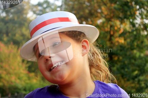 Image of girl wearing 4th of July top hat