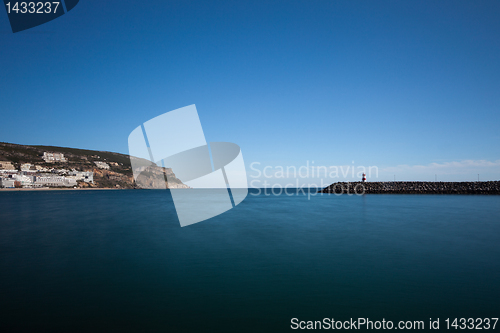 Image of Lighthouse in port.