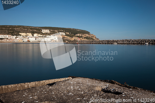 Image of Lighthouse in port.