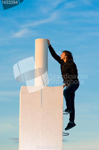 Image of Reaching out for the top