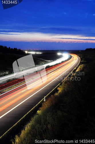 Image of night traffic on highway