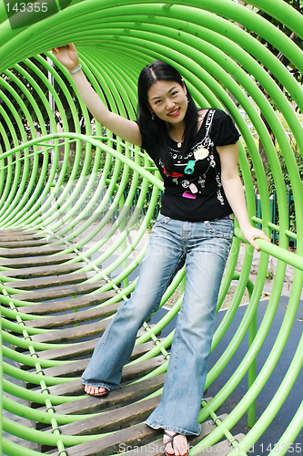 Image of Asian woman playing