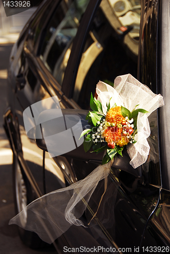 Image of Wedding decoration on car