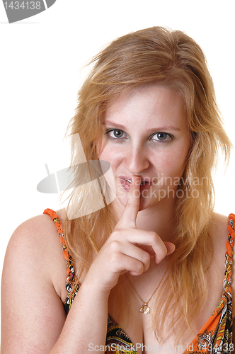 Image of Girl tells, be quiet.