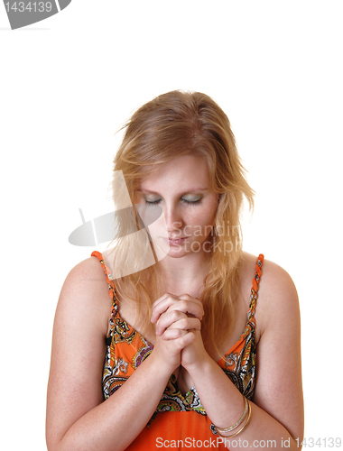 Image of Teen girl praying.