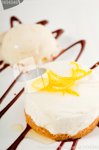 Image of  lemon mousse served whith lemon peel on top