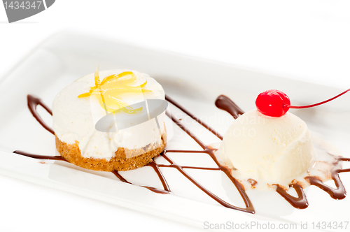 Image of  lemon mousse served whith lemon peel on top