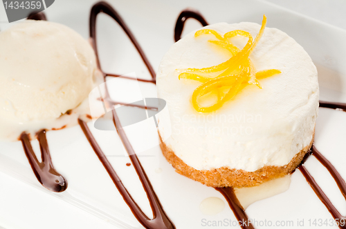 Image of  lemon mousse served whith lemon peel on top
