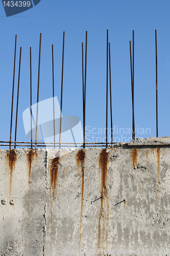 Image of Old reinforcing steel protruding from the concrete