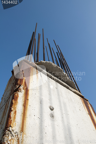 Image of Old reinforcing steel protruding from the concrete