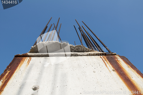 Image of Old reinforcing steel protruding from the concrete