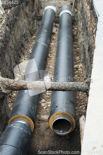 Image of Installing pipes for hot water and steam heating