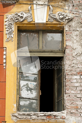 Image of Old window with broken glass