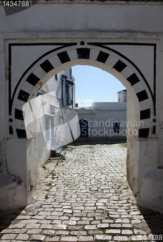 Image of Sidi Bou Said - typical building with white walls, blue doors and windows