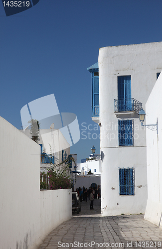 Image of Sidi Bou Said - typical building with white walls, blue doors and windows