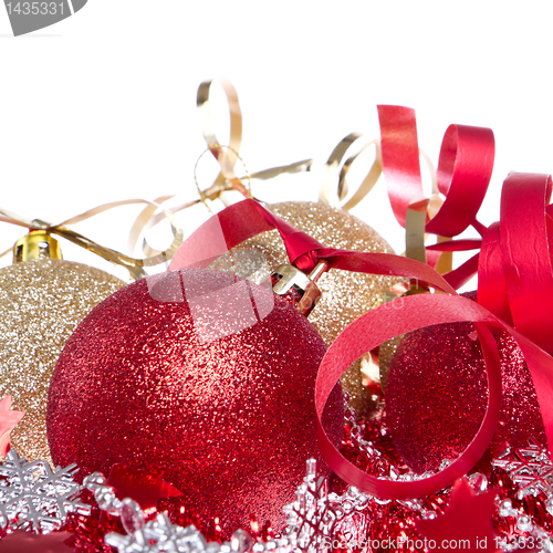 Image of christmas balls with ribbon and tinsel