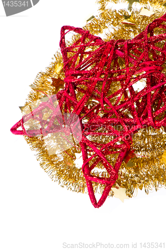 Image of red christmas star with golden tinsel