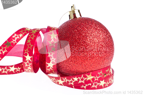 Image of red christmas ball with ribbon