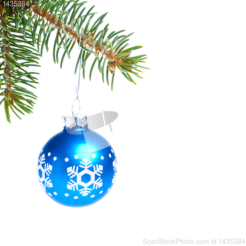 Image of ball hanging from spruce christmas tree