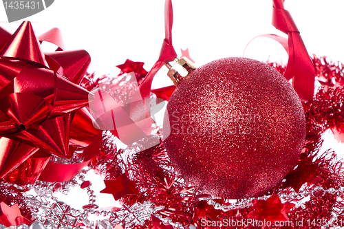 Image of ball with ribbon and tinsel