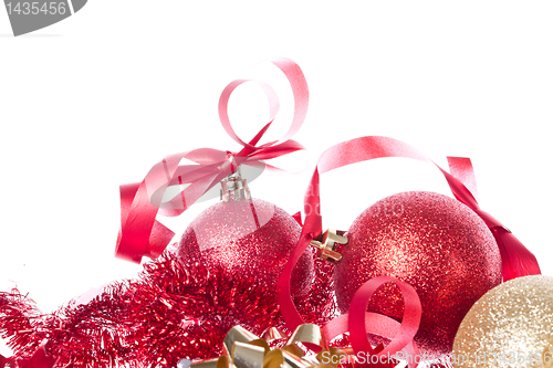 Image of christmas balls with ribbon and tinsel