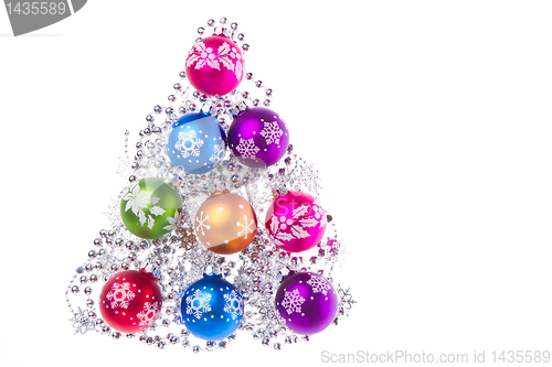 Image of christmas balls with snowflake symbols