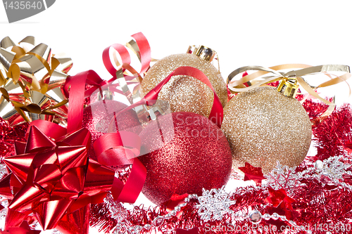 Image of christmas balls with ribbon and tinsel