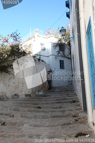 Image of Sidi Bou Said - typical building with white walls, blue doors and windows