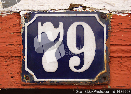 Image of House number tile plaque with floral ornament