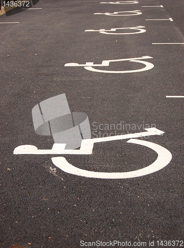 Image of Handicap sign on asphalt