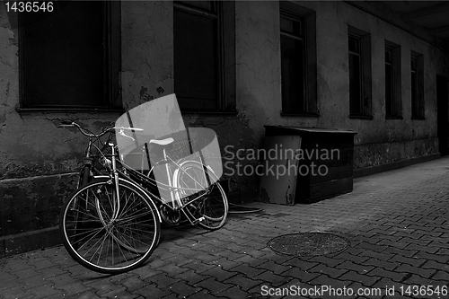 Image of Vintage bikes over old wall